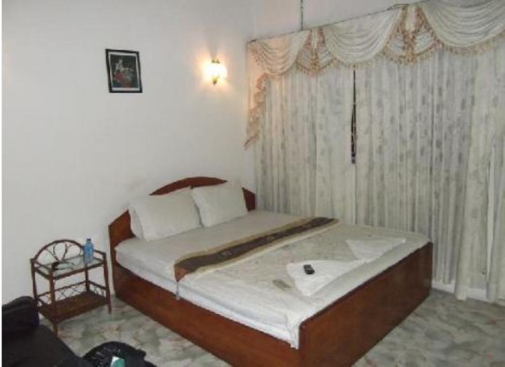Royal Guest House Phnom Penh Quarto foto