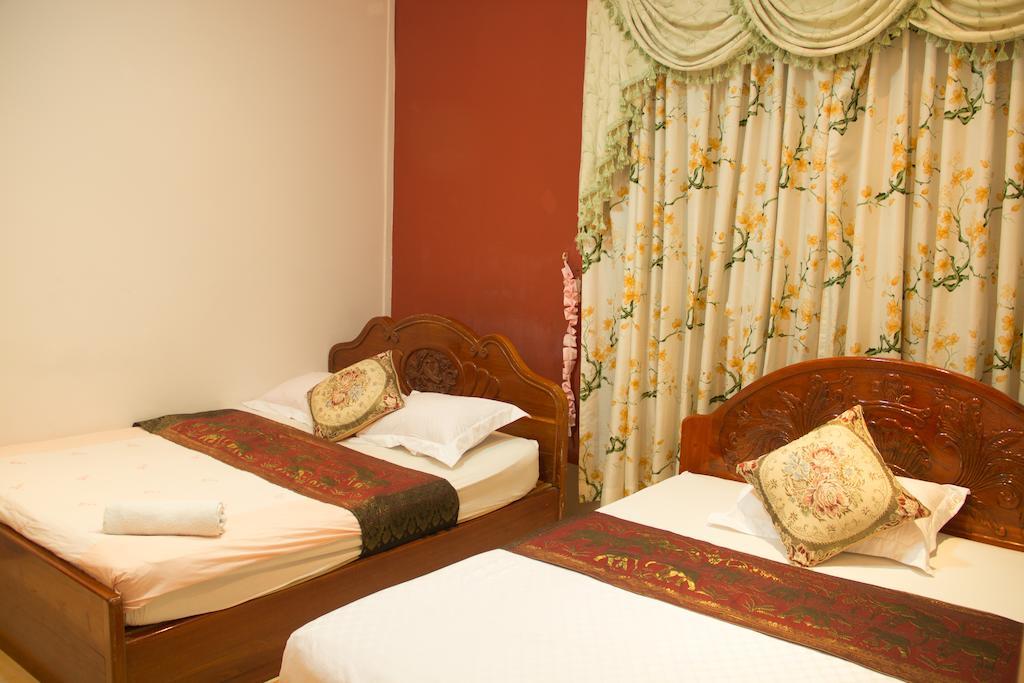 Royal Guest House Phnom Penh Quarto foto